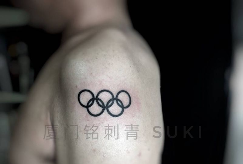 老师25年的奥运梦纹身图片