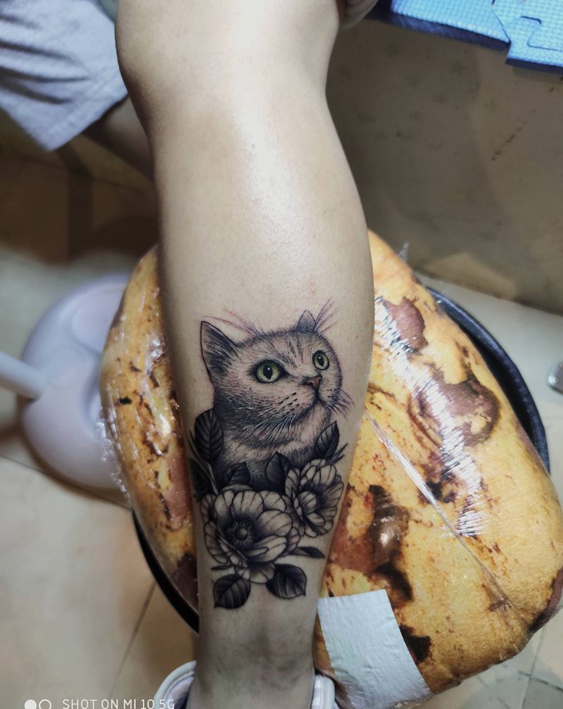 写实猫咪纹身图片_腿部欧美写实纹身图案