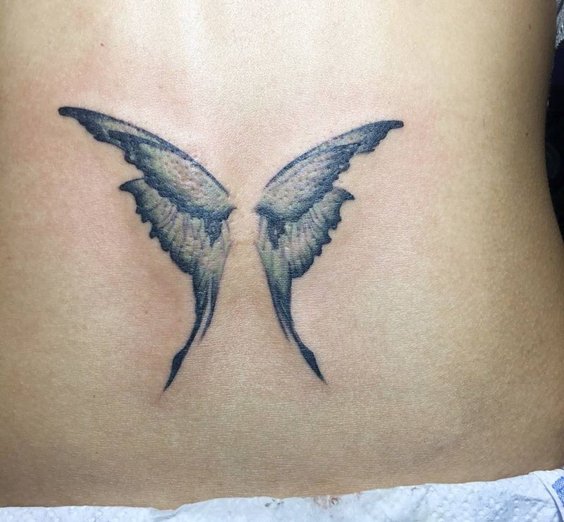 疤痕遮盖蝴蝶纹身图片