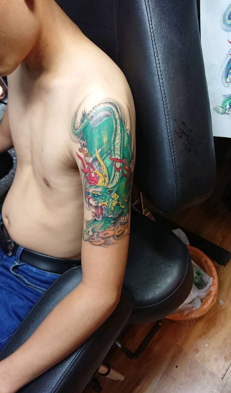 皮丘盖图纹身图片_手臂传统鬼神成品纹身图案