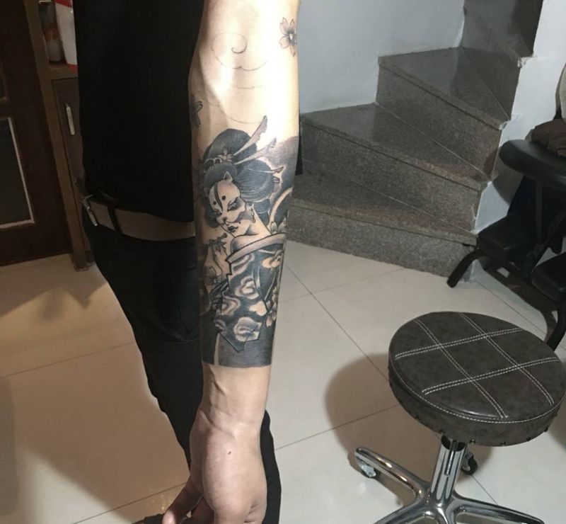 花臂未完待续纹身图片