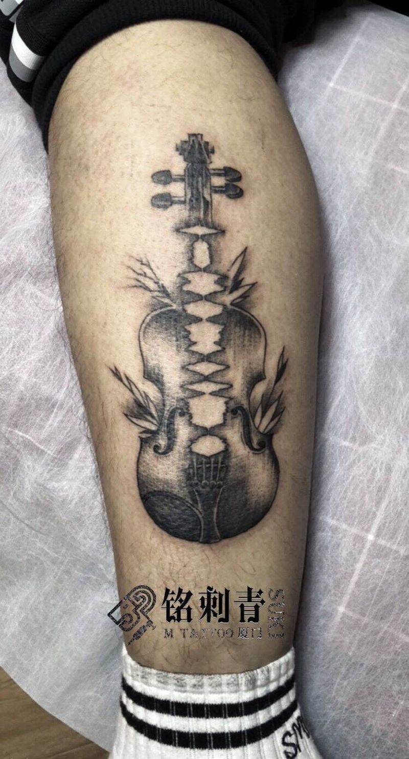 波纹纹身纹身图片_腿部点刺纹身图案