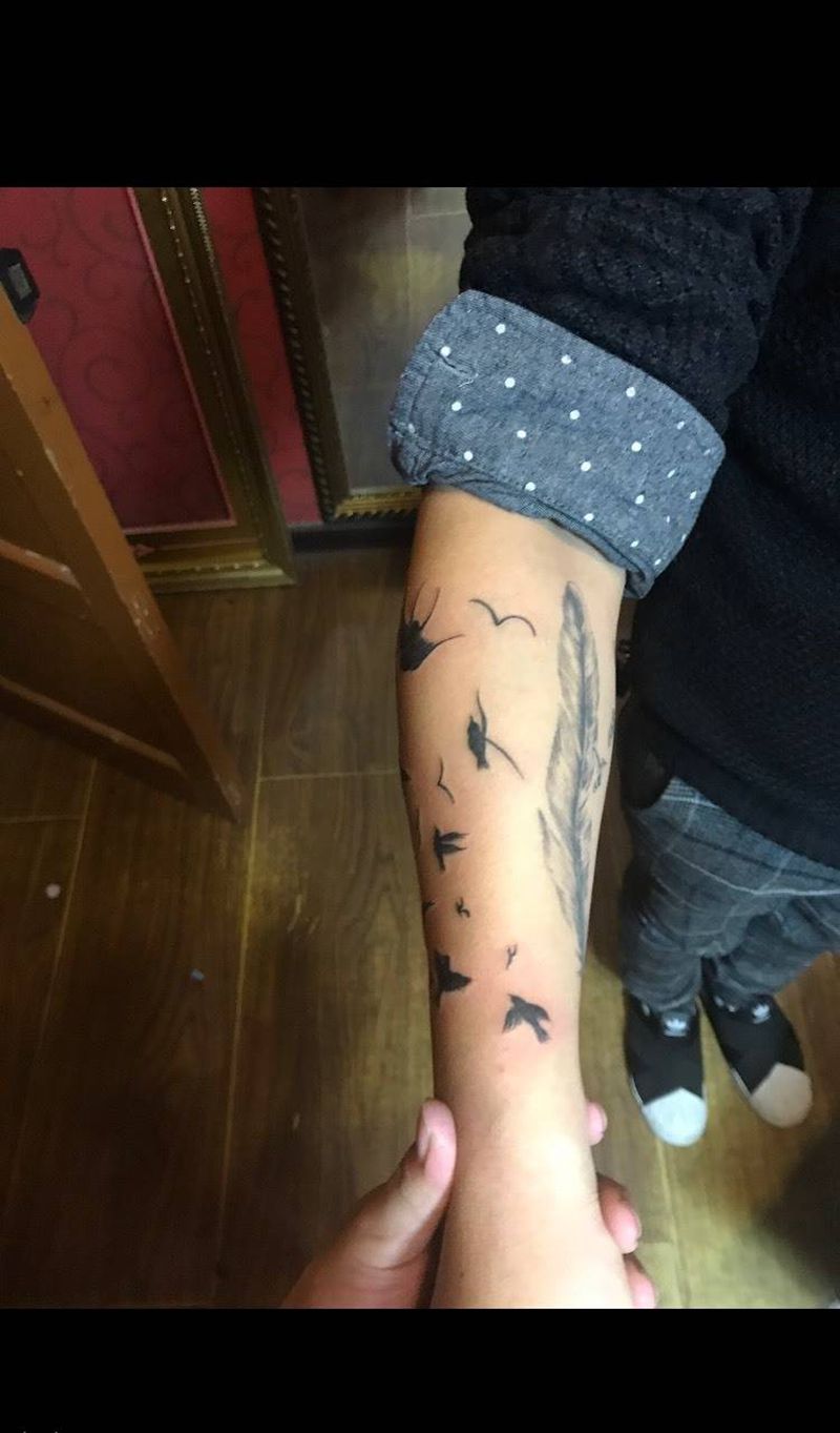 小臂鸟纹身图片