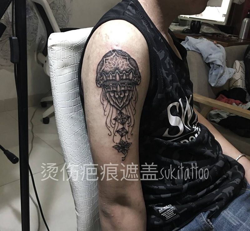 烫伤疤痕遮盖纹身图片_欧美动物成品手臂纹身图案