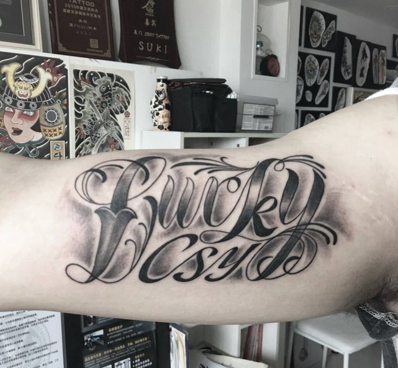 原创奇卡诺花体纹身图片