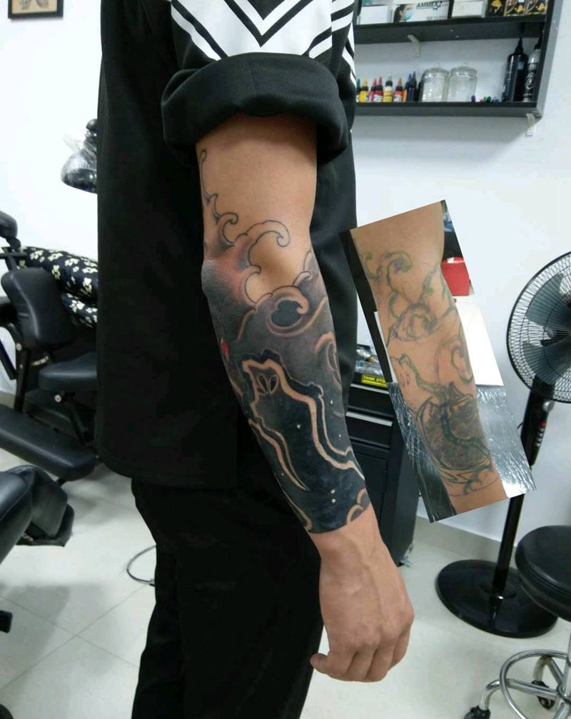 水浪包小臂遮盖旧纹身纹身图片_手臂老传统水浪纹身图案