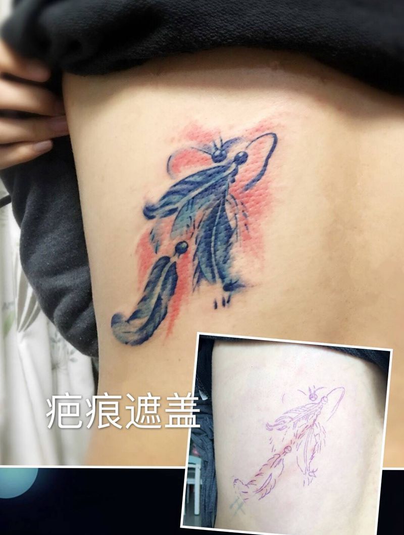 水彩羽毛遮盖疤痕纹身图片_成品背部欧美原创纹身图案