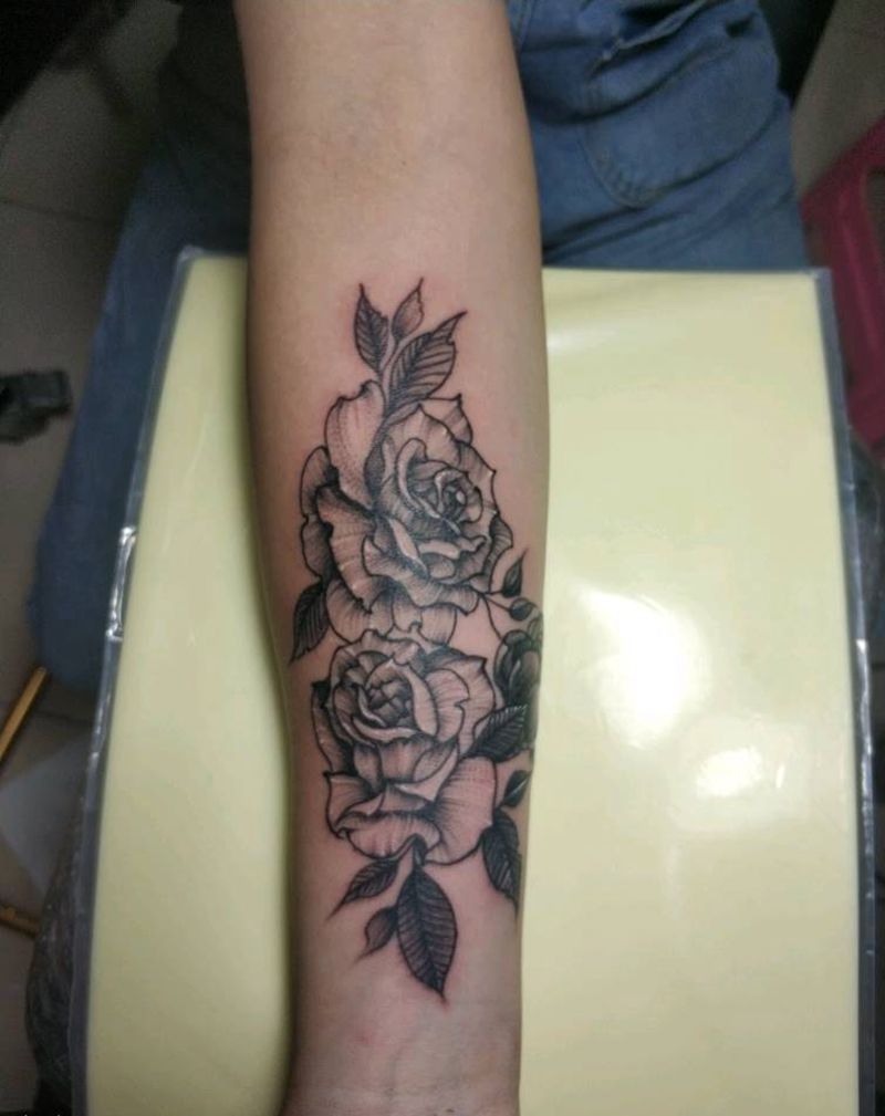 遮盖英文花卉纹身图片_手臂点刺纹身图案