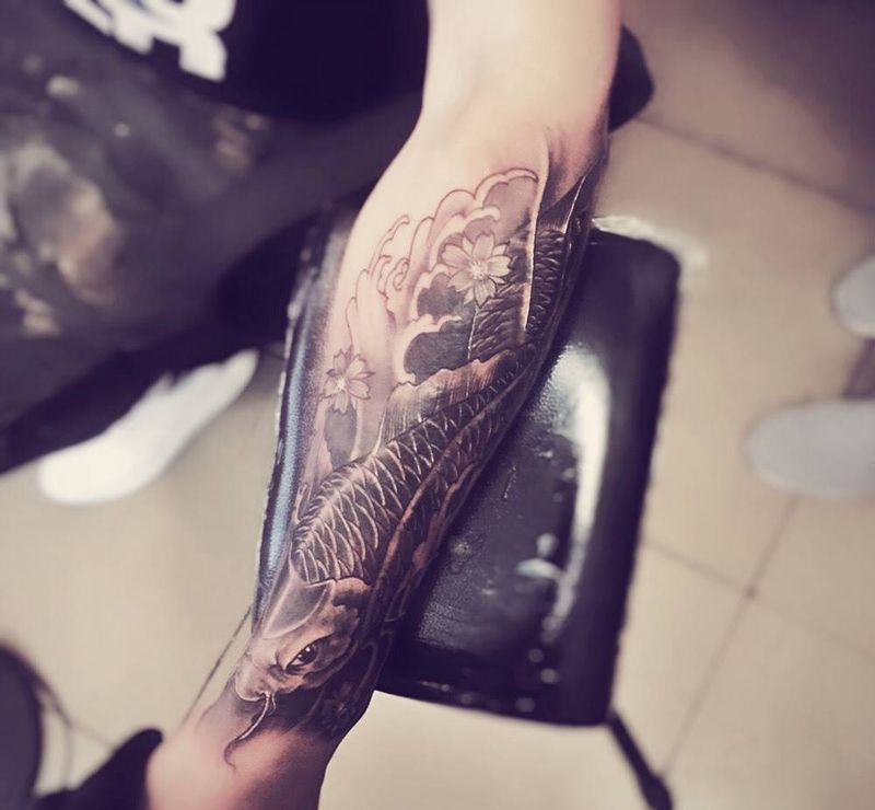 鱼遮盖纹身图片