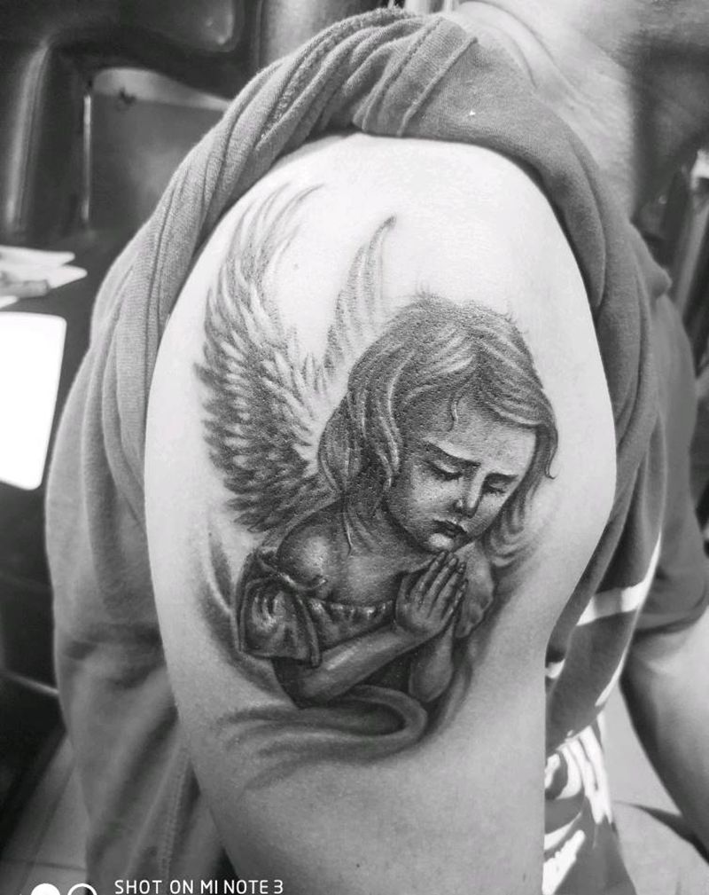 小天使纹身图片_手臂欧美写实纹身图案