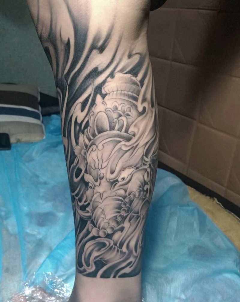小腿象神纹身图片_腿部纹身图案