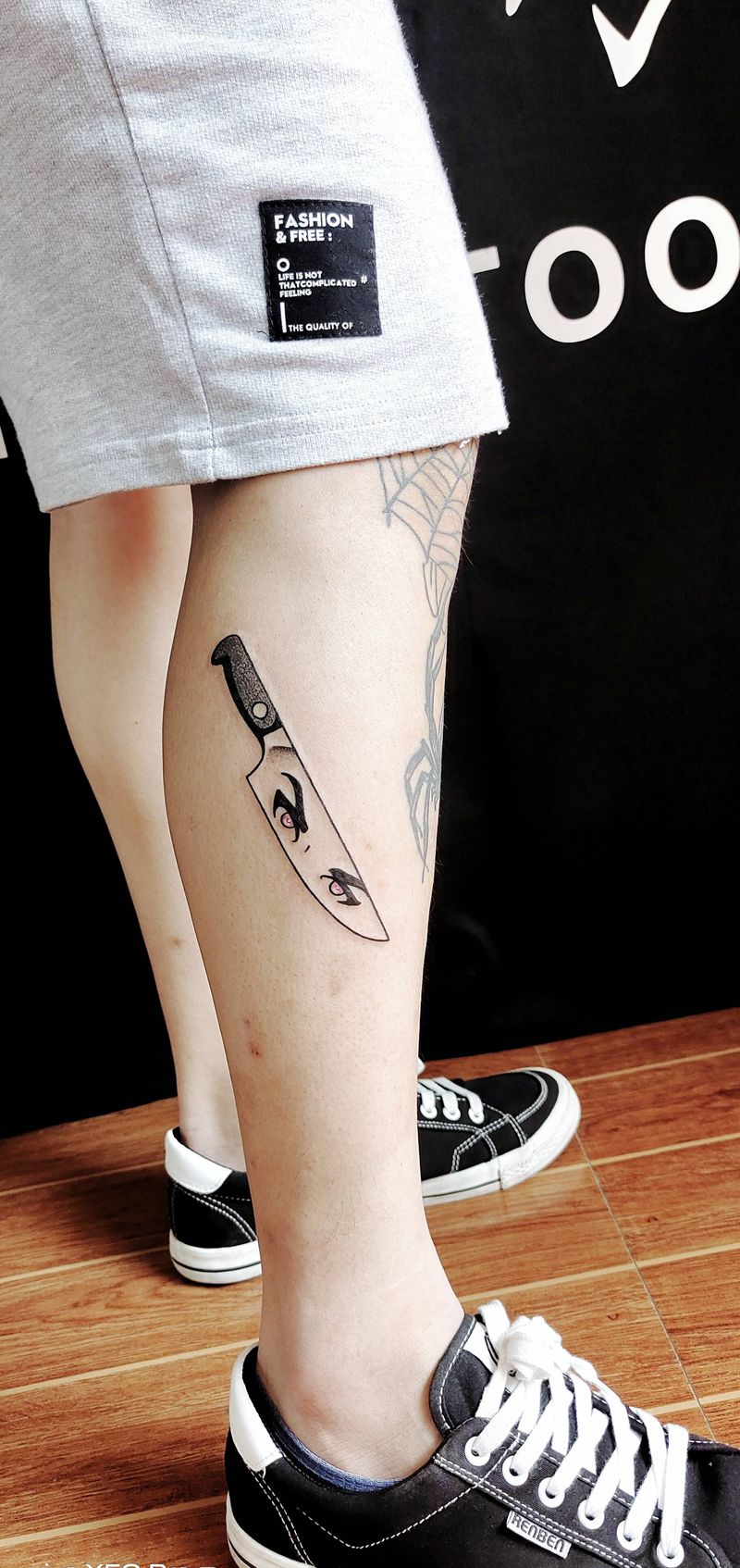 黑色小图纹身图片_腿部纹身图案