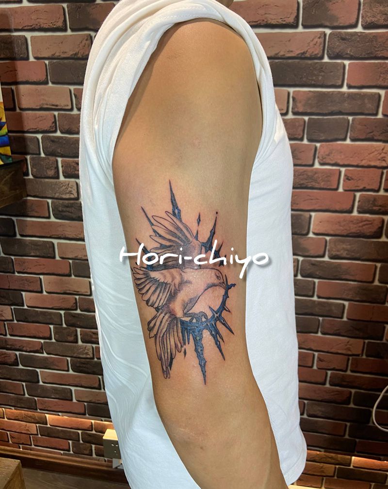 Dove&Spur纹身图片_手臂欧美写实纹身图案