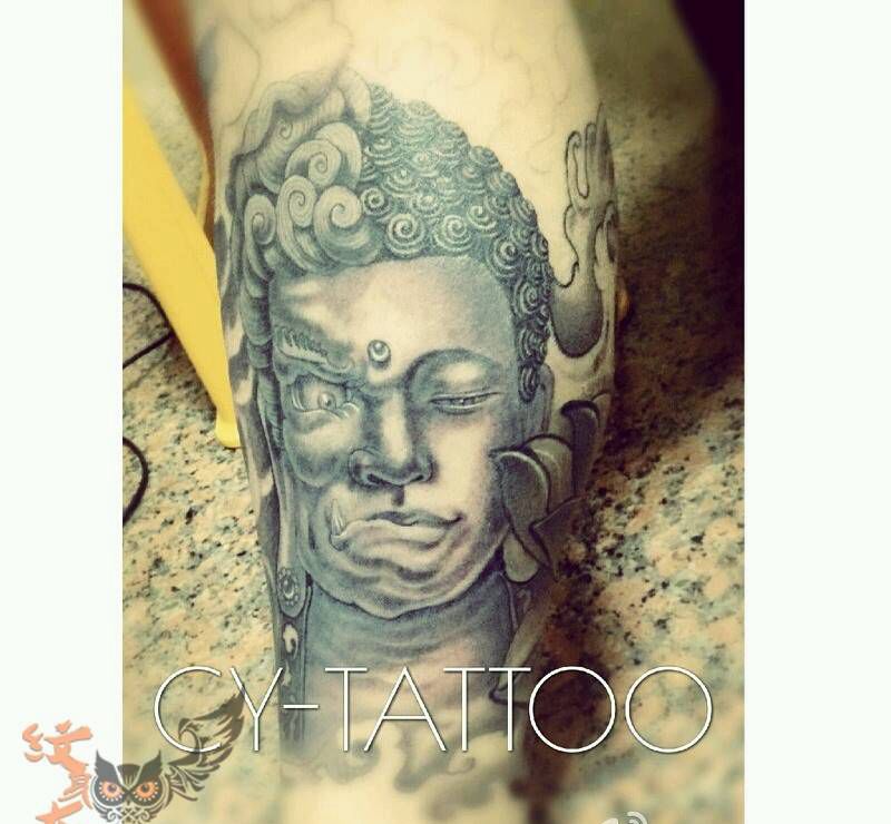 半佛半魔纹身图片