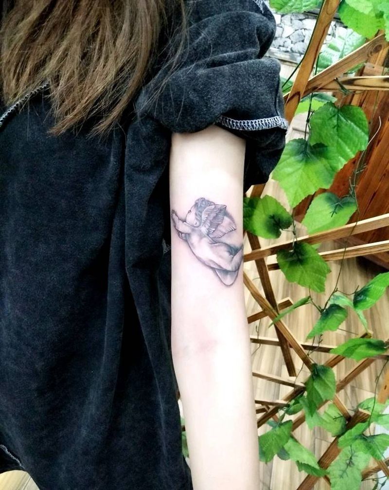 小天使纹身图片_手部欧美写实纹身图案