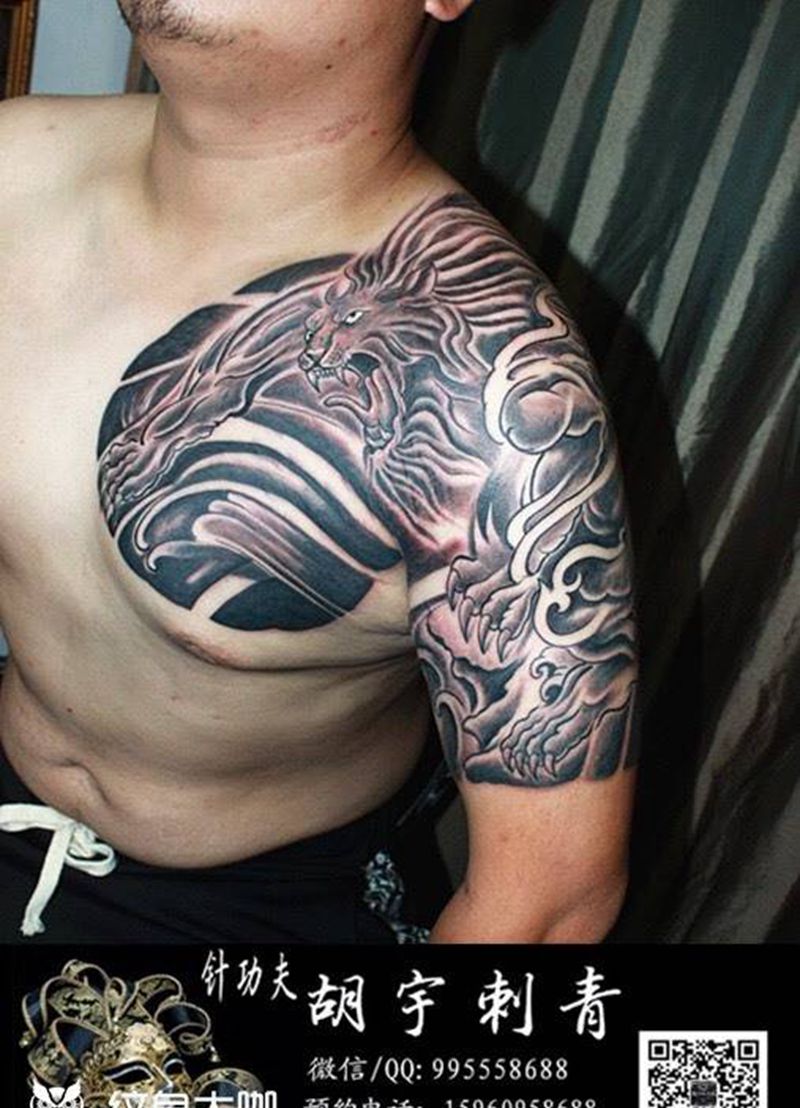 半甲唐狮纹身图片_成品臀部胸部国画动物纹身图案