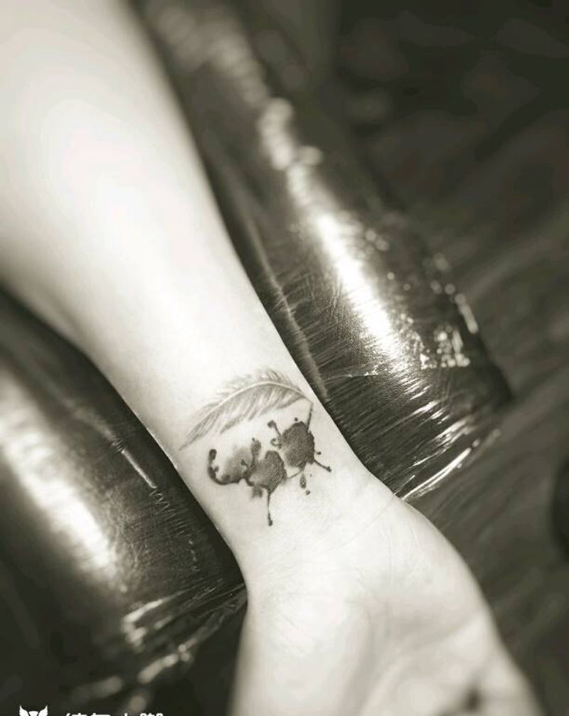 墨滴遮盖英文纹身纹身图片