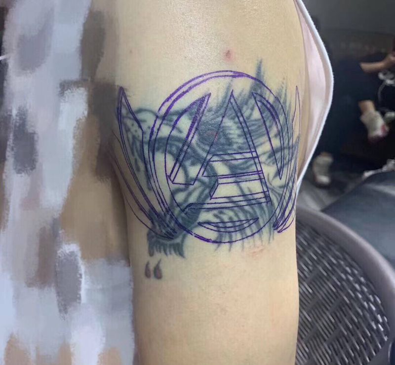 旧图遮盖纹身图片_手臂遮盖纹身图案