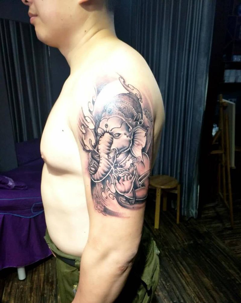 大臂象神纹身图片