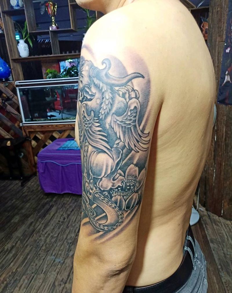 大臂貔貅纹身图片