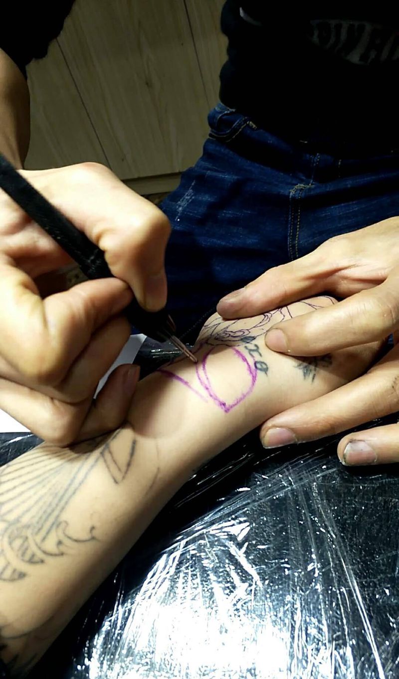 牡丹花遮蓋旧纹身纹身图片