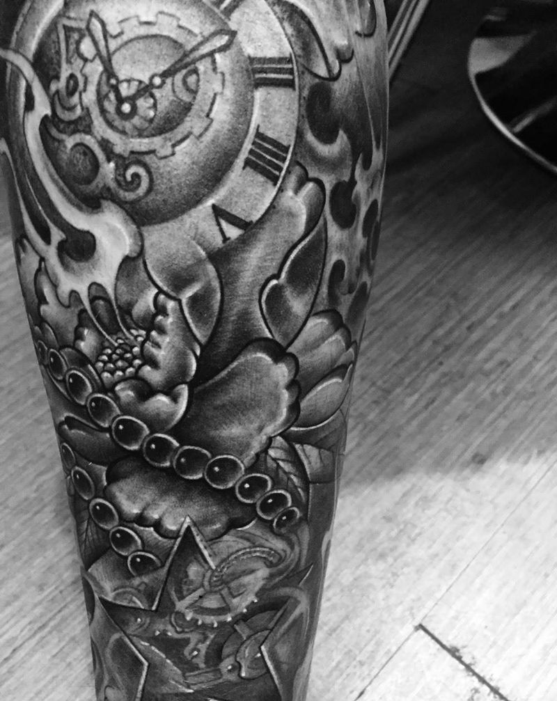 小腿牡丹纹身图片