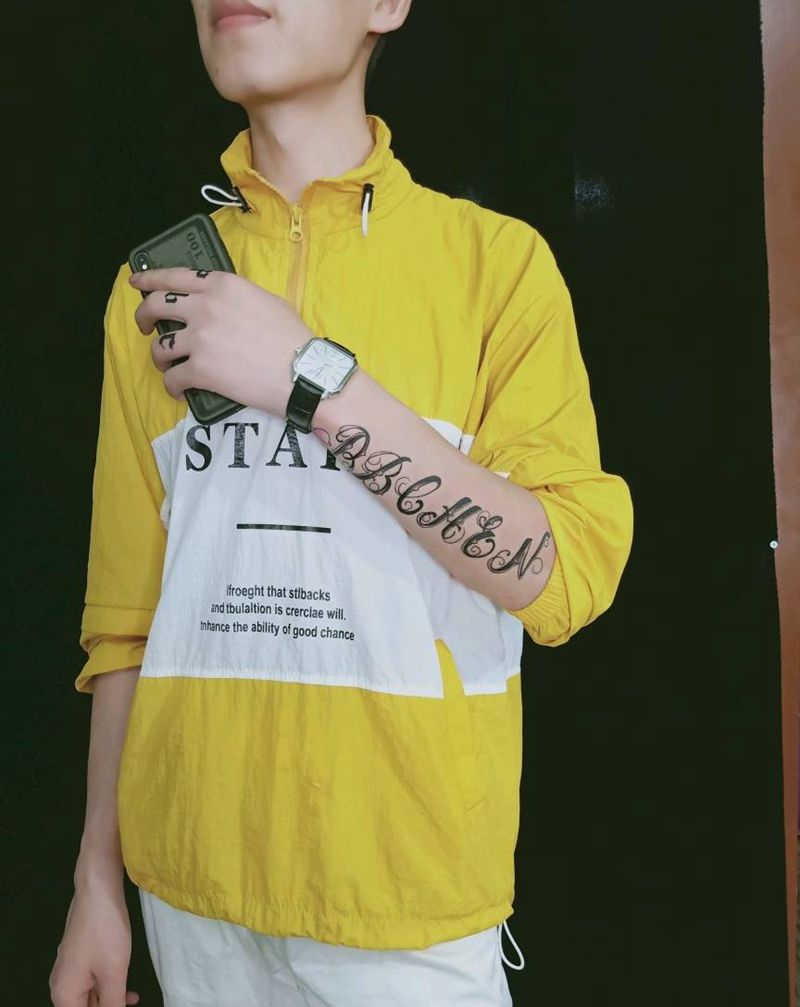 花体纹身图片_手臂花体字纹身图案