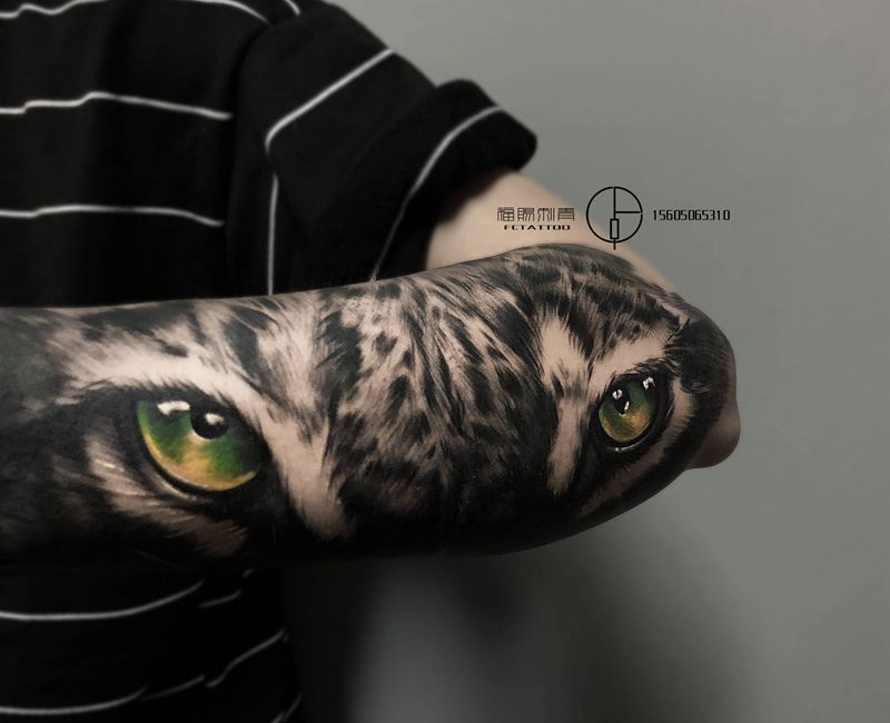 虎眼纹身图片_手臂欧美写实老虎纹身图案
