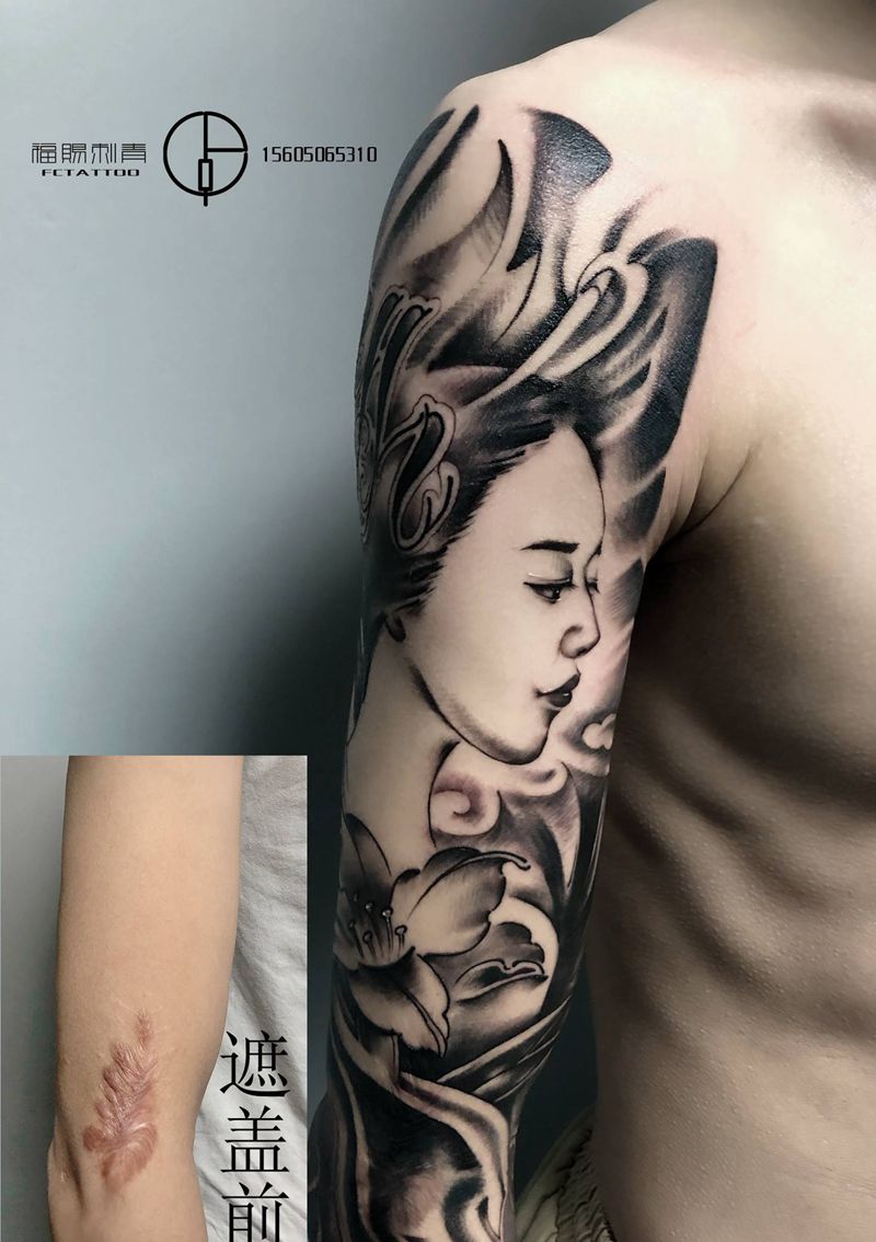 遮盖纹身图片_手臂欧美写实水墨纹身图案