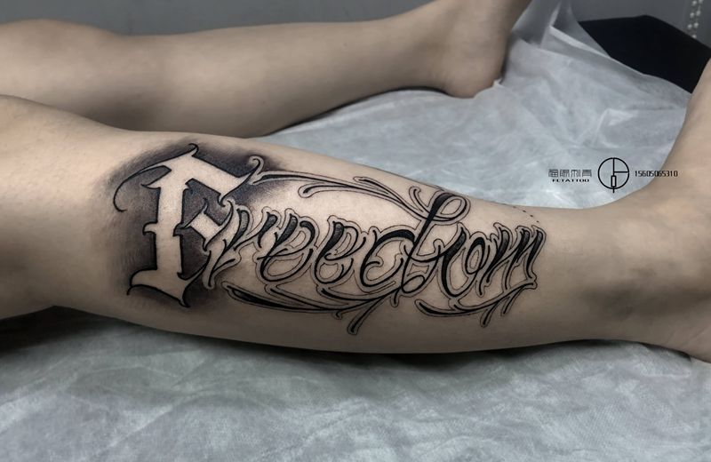 花体纹身图片_腿部花体字纹身图案