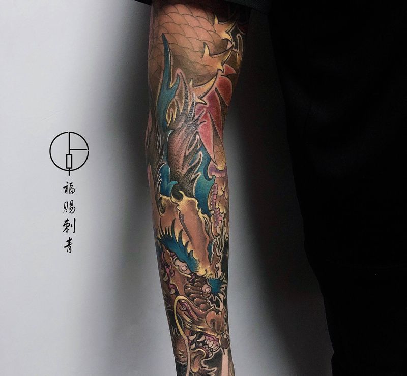 花臂龙纹身图片_手臂手部新传统老传统纹身图案