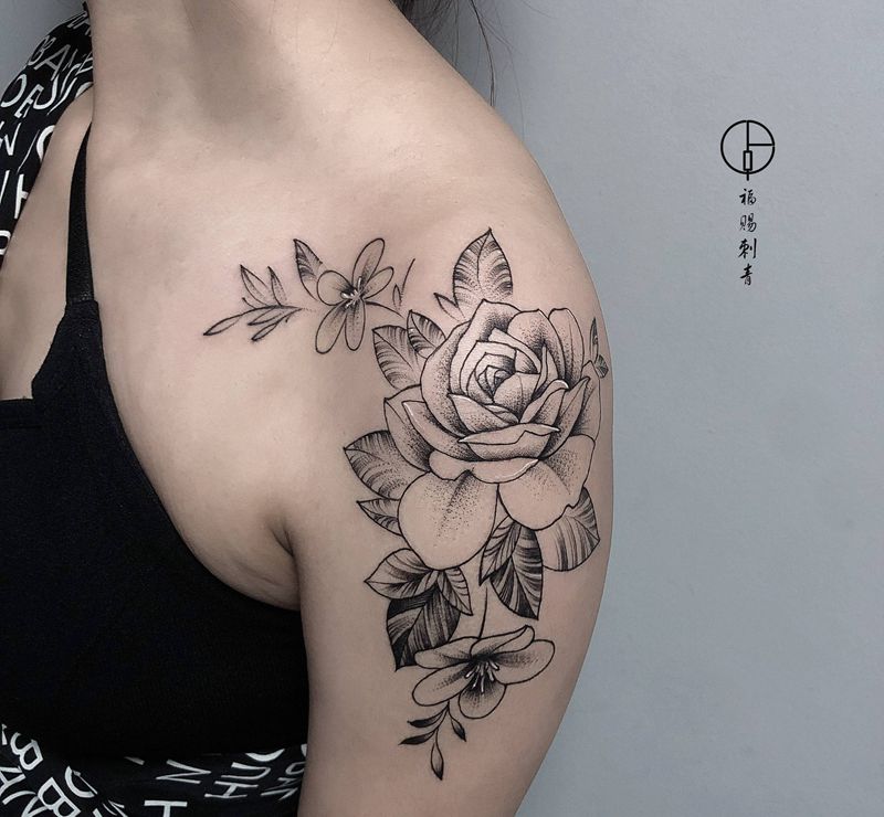 花卉纹身图片_肩部手臂点刺几何纹身图案