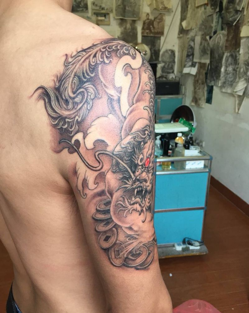 皮修纹身图片_成品肩部传统鬼神纹身图案