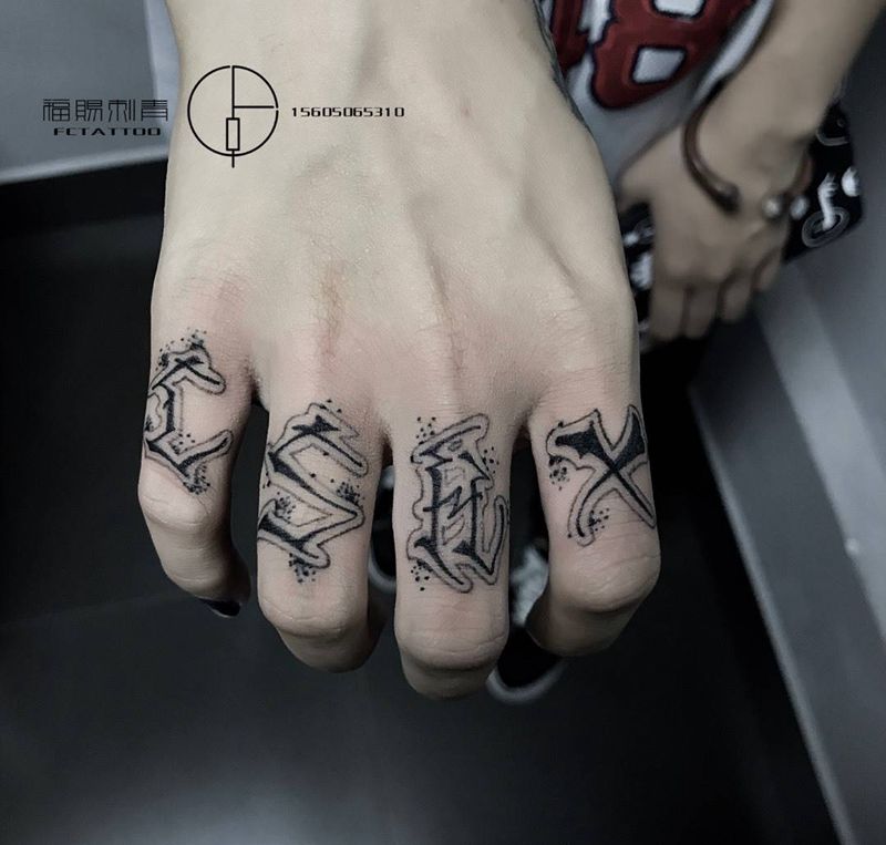 手指花体纹身图片