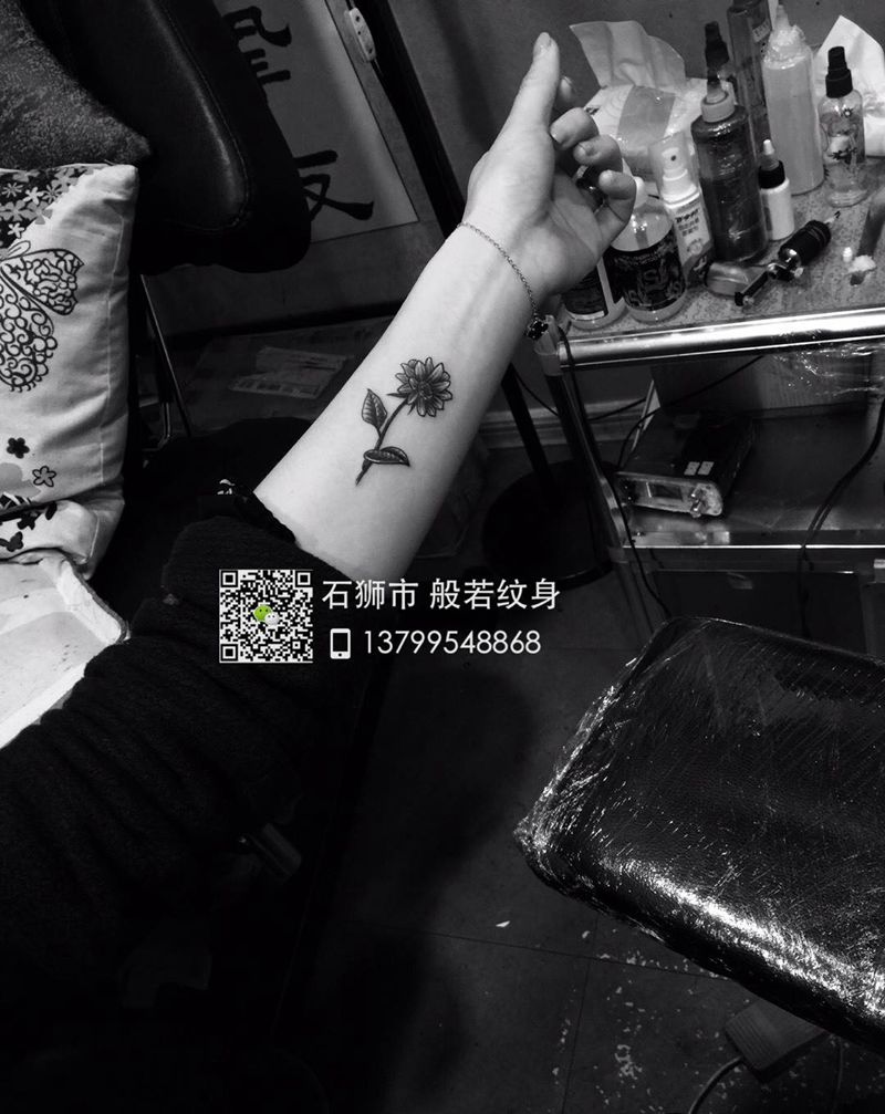 太阳花纹身纹身图片