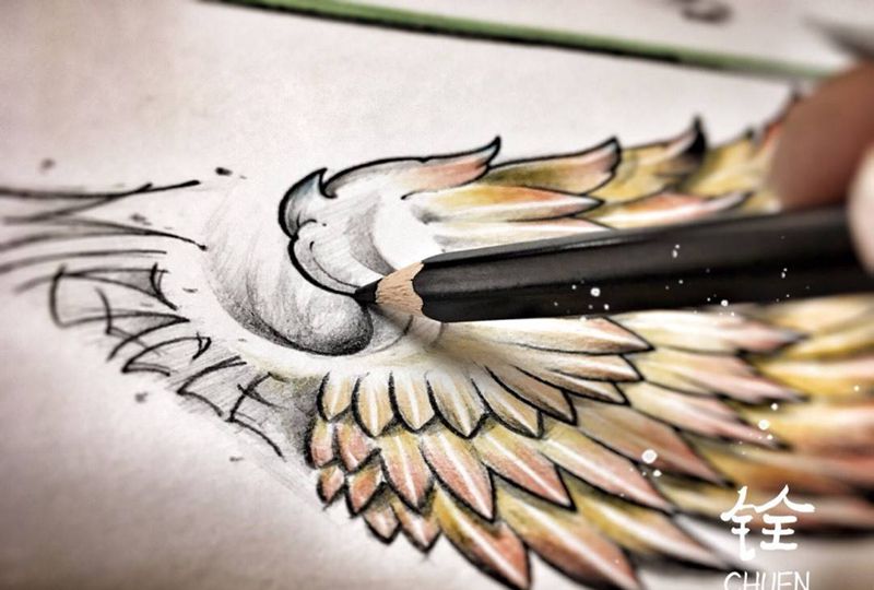 金翅纹身图片_肩部腹部腿部手臂欧美手稿原创动物纹身图案