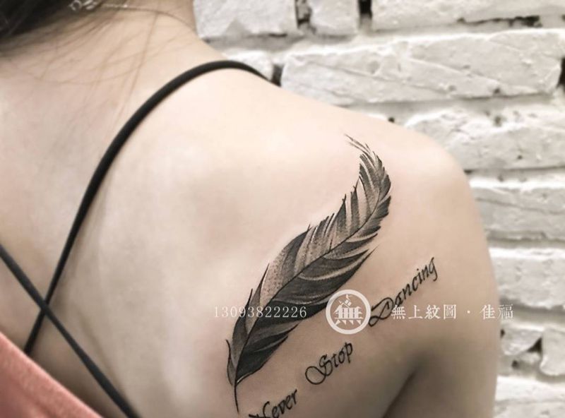 扫针羽毛纹身图片