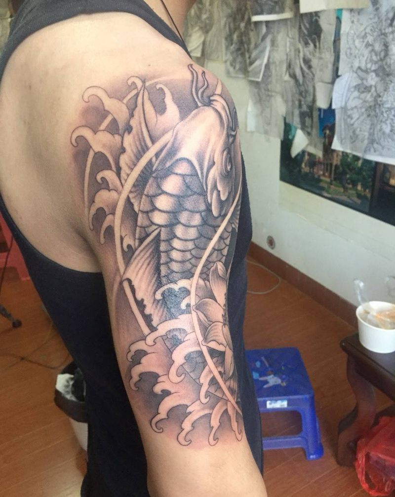 鱼纹身图片_成品肩部手臂传统动物纹身图案