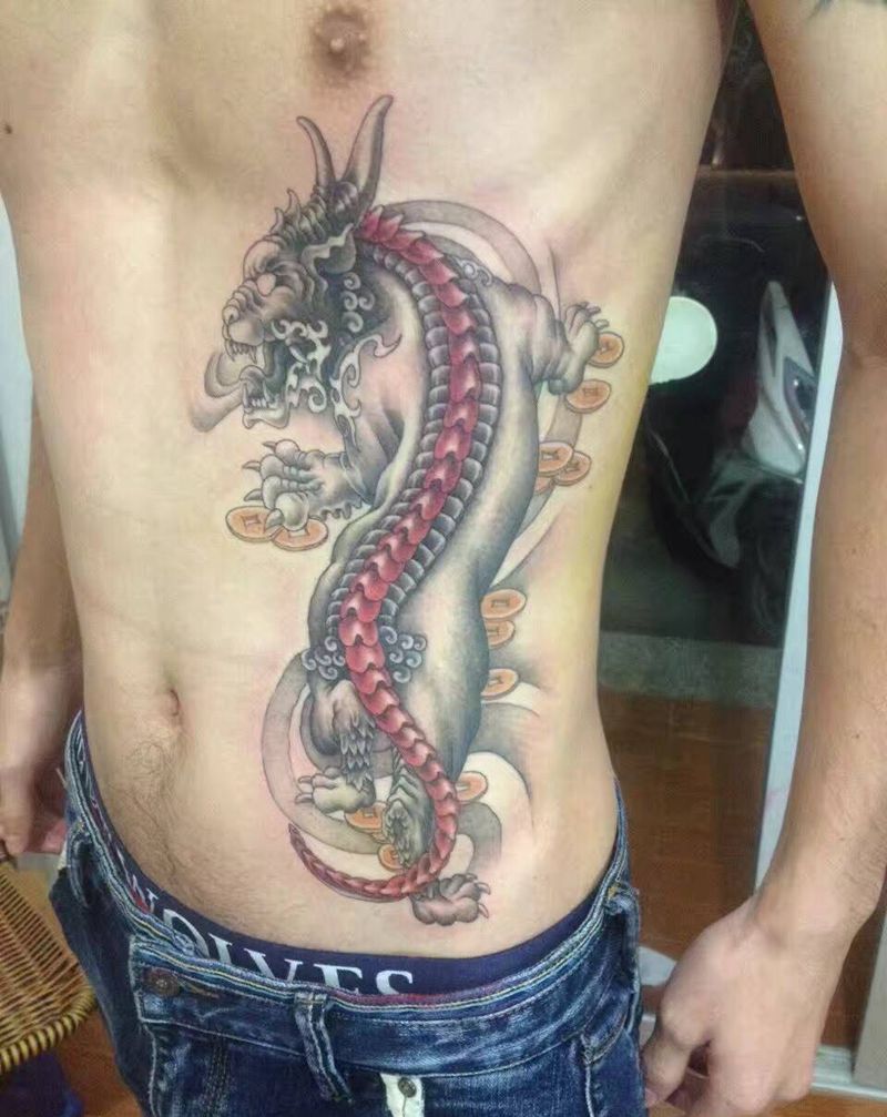 皮休纹身图片_成品腹部传统鬼神纹身图案