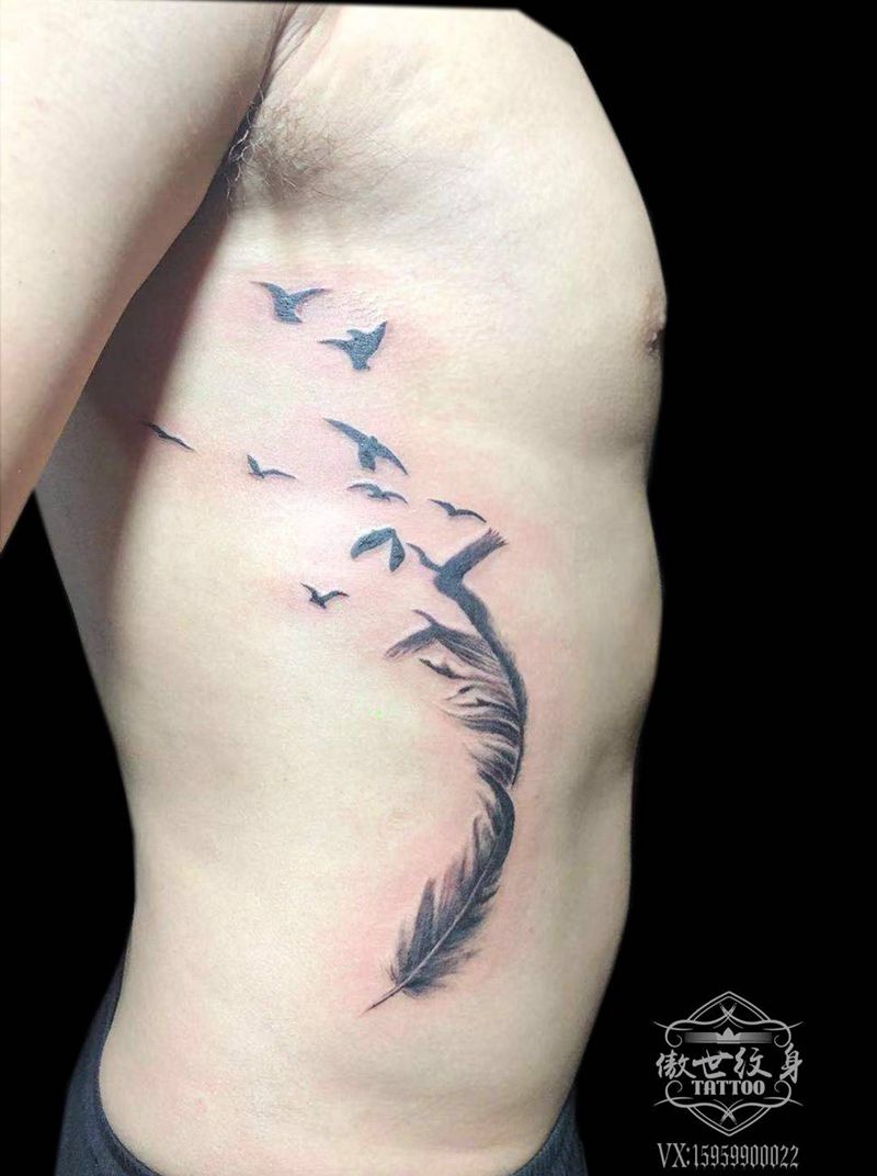 羽毛纹身图片_腰部水墨纹身图案