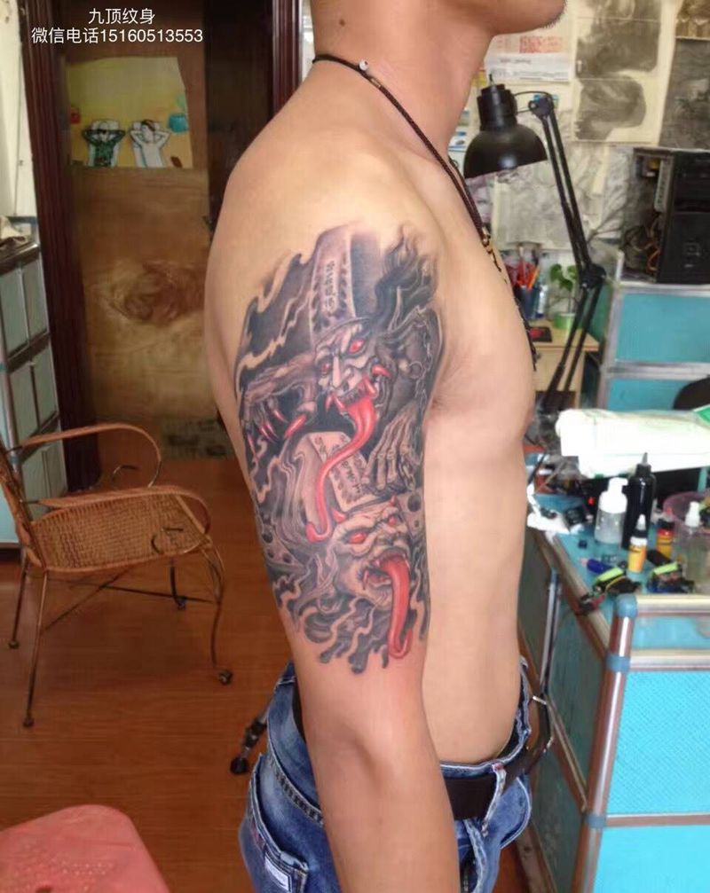 黑与白纹身图片_成品手臂传统鬼神纹身图案