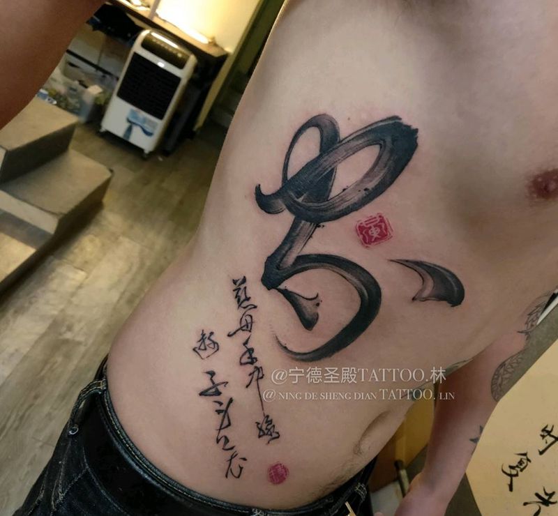 家纹身图片_腹部纹身图案