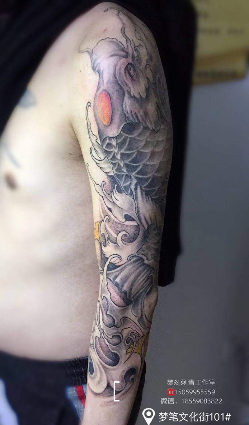 整臂，鱼纹身图片_手臂纹身图案