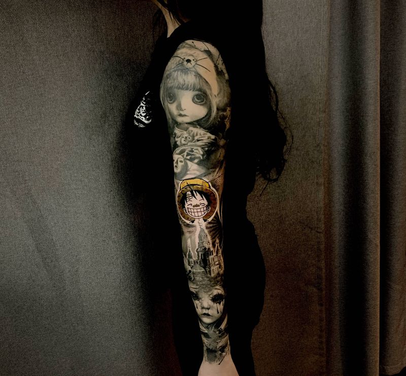 娃娃的心纹身图片_手臂手部欧美写实纹身图案