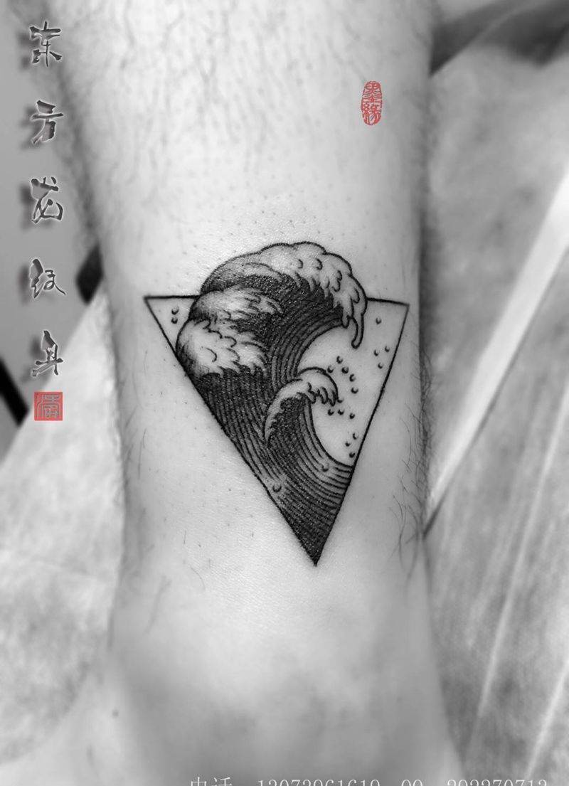 浪纹身图片_成品腿部脚部东方龙宁德纹身图案