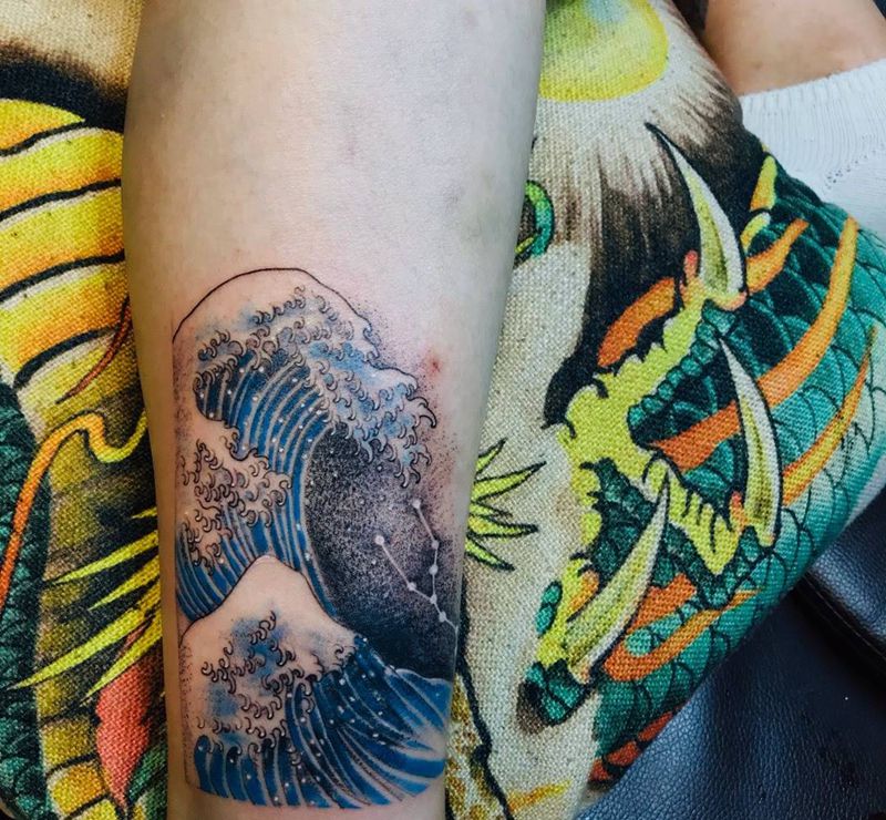 浪花遮盖纹身图片