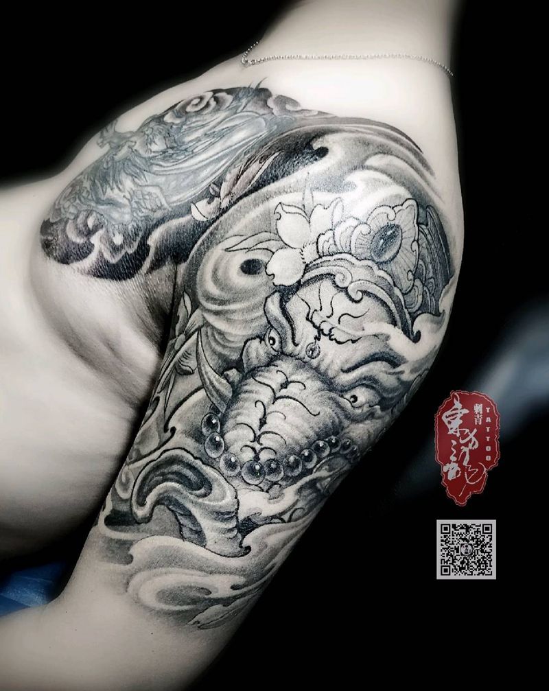 半胛纹身图片_手臂新传统象神纹身图案