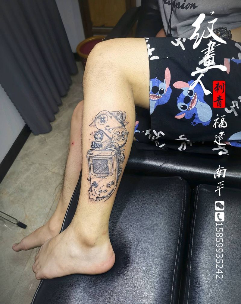 任天堂游戏机纹身图片_腿部点刺纹身图案