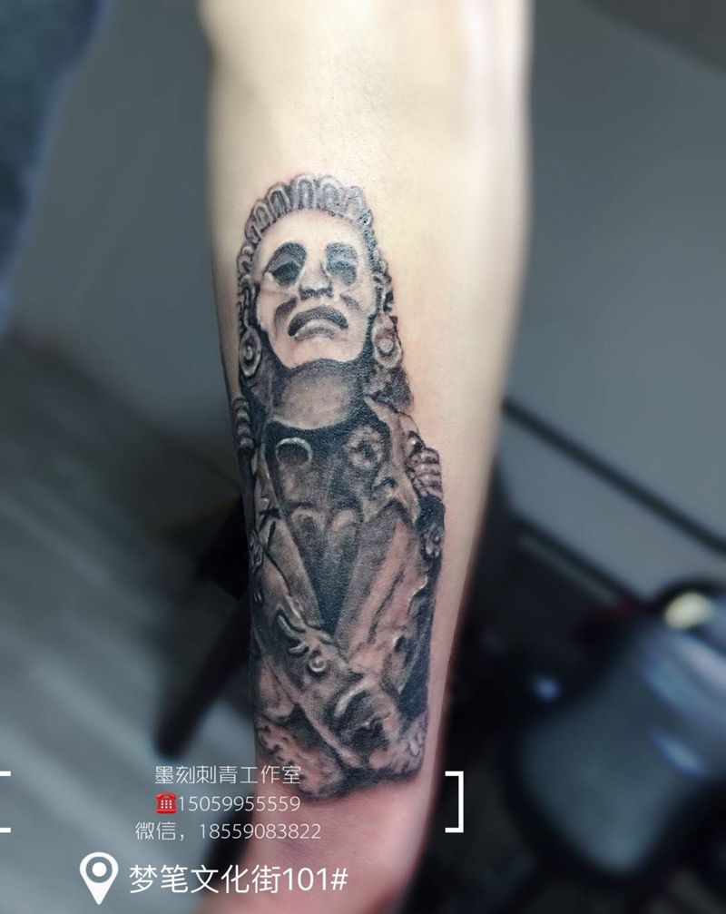 玛雅石像纹身图片