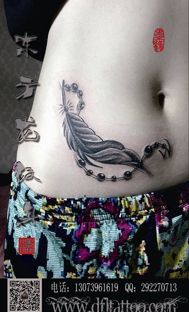 羽毛纹身纹身图片_腹部腰部清新静物东方龙纹身图案